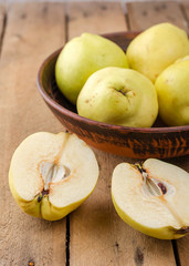 Quince on a dark background.