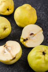 Quince on a dark background.