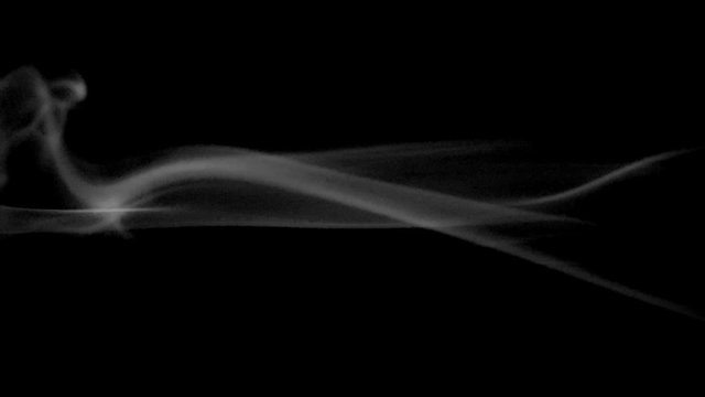 A slow motion smoke effect on a black background