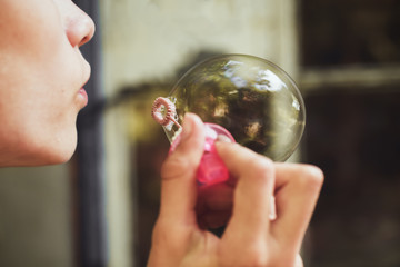 air bubble closeup inflates girl