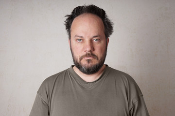  grubby scruffy man in his forties 