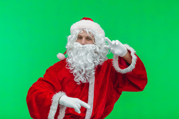 Santa Claus dancing at Christmas party on green background, Chroma key