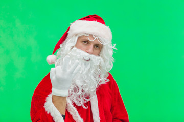 Naklejka premium Santa Claus showing three finger. chromakey. close up