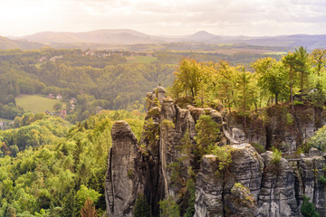 Panorama view on the beautiful rock formation of Bastei in Saxon Switzerland National Park, near Dresden and Rathen - Germany. Popular travel destination in Saxony.