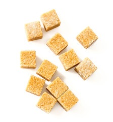 brown sugar cubes isolated on white