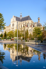 The church of Saint-Eustache in Les Halles district in Paris, France, reflecting in a reflection pool.