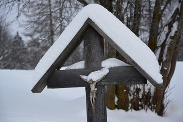 Jesus Christ cross with snow