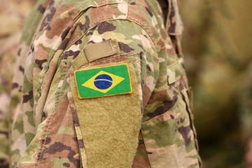 Brazil flag on soldiers arm. Brazil troops (collage)
