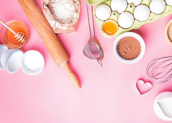 Fototapeta na wymiar Tools and ingredients for making sweet bakery like pie or cupcakes.