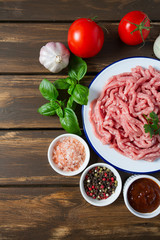 minced meat on wooden surface