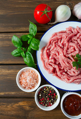 minced meat on wooden surface