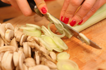slicing mushrooms and leek onions