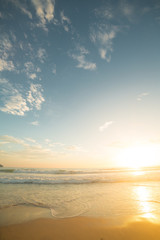 Obraz na płótnie Canvas Golden hour on the beach