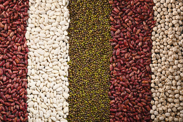 Pattern with white beans, red beans, mung and chickpea. Horizontal. Top view.