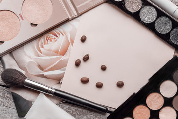 Cosmetic make up flat lay pink background copy space text beauty graphic content