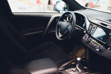Fototapeta na wymiar Leather upholstery inside the car modern interior.