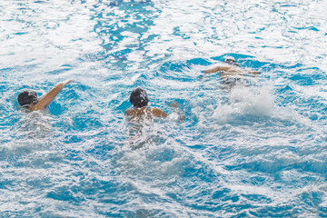 water polo competition in a pool for children and adolescents. water sports and swimming pool championship.