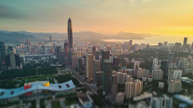 shenzhen cityscape KK100 building sunset sky downtown city hall aerial panorama 4k tilt shift timelapse china
