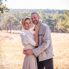 Fototapeta premium Couple in love hugging in the forest.