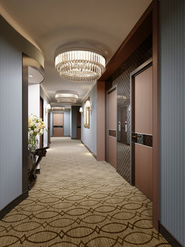 Luxurious modern corridor with blue walls, decorative niches with consoles and glass chandeliers. Interior design of the hall with a door to the hotel rooms.