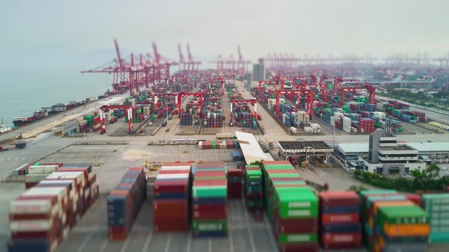 day time shenzhen city famous port aerial panorama 4k tilt shift timelapse china
