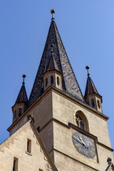 Fototapeta na wymiar Santa Maria church clock tower