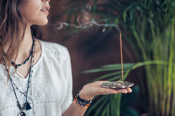 Incense Stick. Caucasian Woman Enjoying Aroma Stick - obrazy, fototapety, plakaty