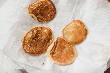 Ready pancakes on a plate. Rosy fresh and tasty pastries. Ready breakfast on a plate.