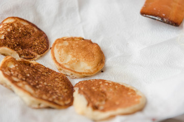 Ready pancakes on a plate. Rosy fresh and tasty pastries. Ready breakfast on a plate.