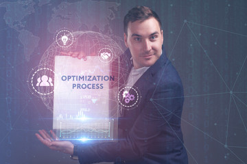 The concept of business, technology, the Internet and the network. A young entrepreneur working on a virtual screen of the future and sees the inscription: Optimization process