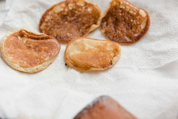 Ready pancakes on a plate. Rosy fresh and tasty pastries. Ready breakfast on a plate.
