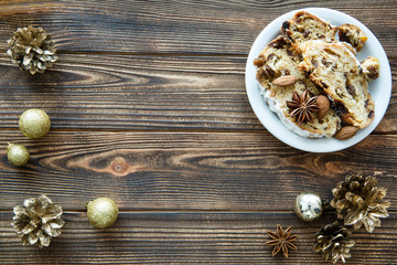 Tradition Christmas cake. Golden Christmas decorations, free space for text.