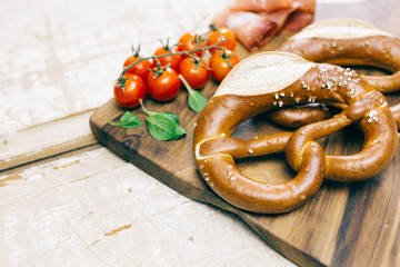 Pretzel concept on bright wooden table