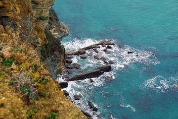 the cliff and ocean in the coast 