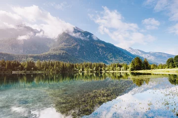 Zelfklevend Fotobehang Famous Hintersee lake at sunny day. World of beauty. © Leonid Tit