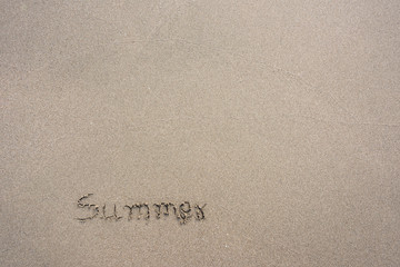 Summer Text message in sand on the beach