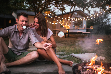 Couple roasting marshmallows