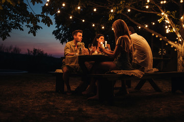 Romantic dinner in a backyard