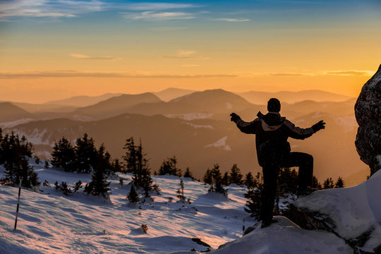 silhouette of man on top of mountain © Andrei