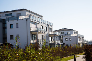 Fototapeta na wymiar Modern residential complex in Germany, blue sky
