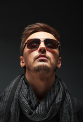 Fototapeta premium portrait of a handsome guy, wearing sunglasses