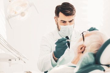 Elderly man visiting the dentist
