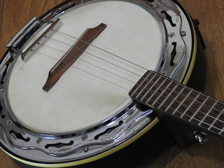 Close-up of a Brazilian string musical instrument: samba banjo. It is widely used to accompany...