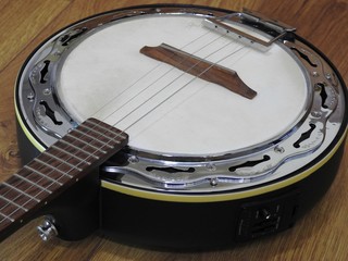 Close-up of a Brazilian string musical instrument: samba banjo. It is widely used to accompany...