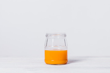 Fresh orange juice in glass jar