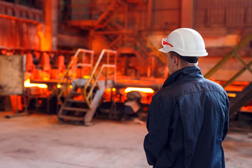 Industrial Worker at the factory welding closeup