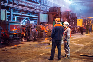 Fototapeta na wymiar Workers in the steel mill.