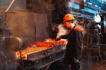 Workers in the steel mill.