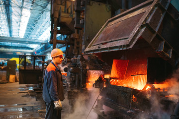 Workers in the steel mill.