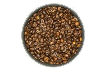 Lot of whole dark brown coffee beans sweet arabica variety in a grey ceramic bowl flatlay isolated on white background